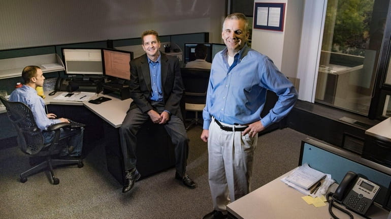 LBi Software president Richard Teed, right, and vice president Gary...