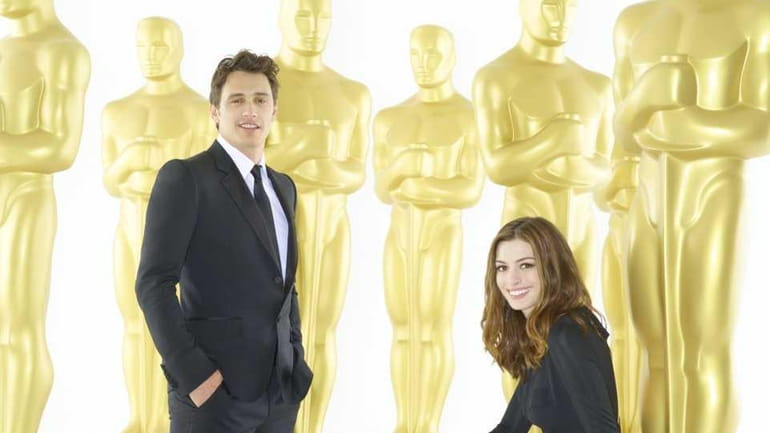 James Franco, left, and Anne Hathaway co-hosted the 83rd Academy...