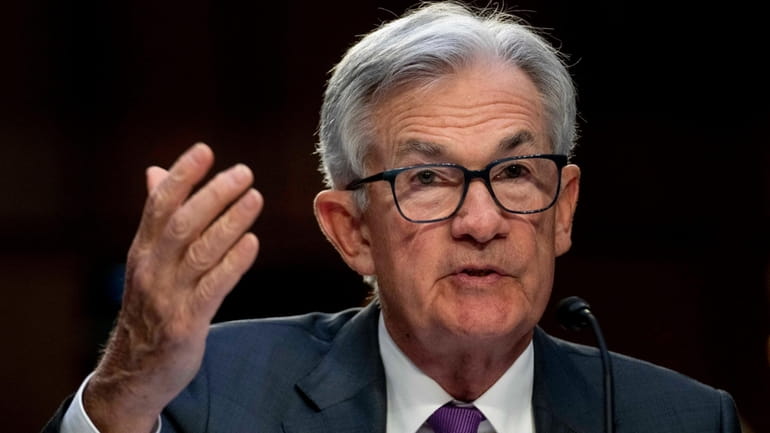 Federal Reserve Chairman Jerome Powell testifies during a Senate Banking...