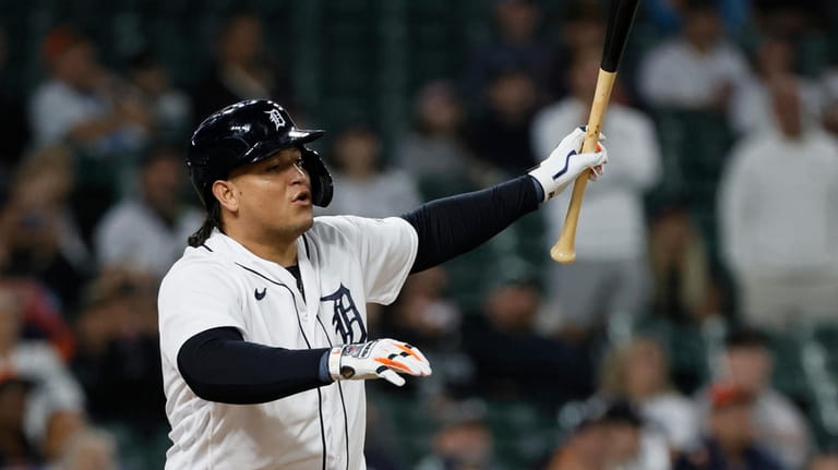 Detroit Tigers' Miguel Cabrera hits a fly ball for an...