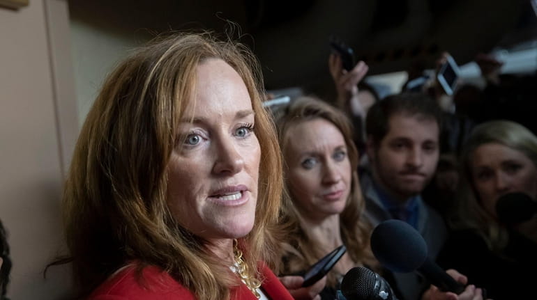 Rep. Kathleen Rice, D-N.Y., talks to reporters about her opposition...