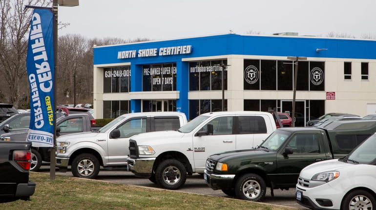The North Shore Certified car dealership, on Route 112 in...