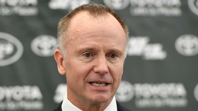 Jets Chairman and CEO Christopher Johnson speaks to the media...