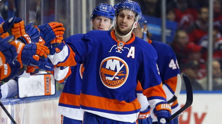 Frans Nielsen of the Islanders celebrates his second period goal...