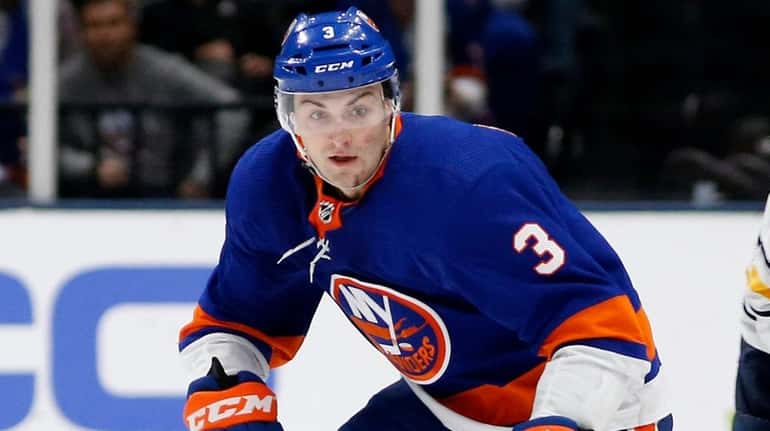 Adam Pelech of the Islanders skates against the Sabres at NYCB...