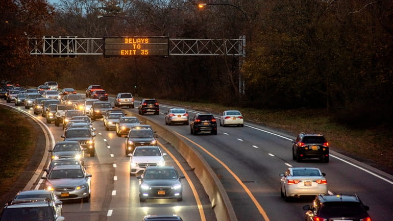 Commuters head home before the Thanksgiving holiday in 2019. Forecasters predict travel this...