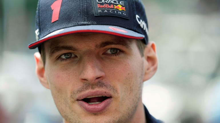 Red Bull driver Max Verstappen of the Netherlands answers to...
