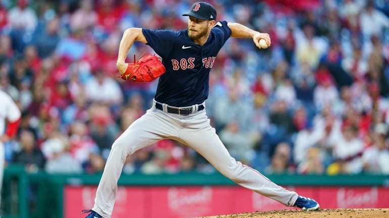 Boston Red Sox starting pitcher Chris Sale delivers during the...