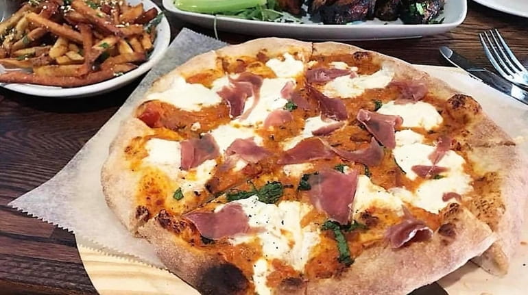Burrata and prosciutto pizza, Parmesan French fries and buffalo wings...
