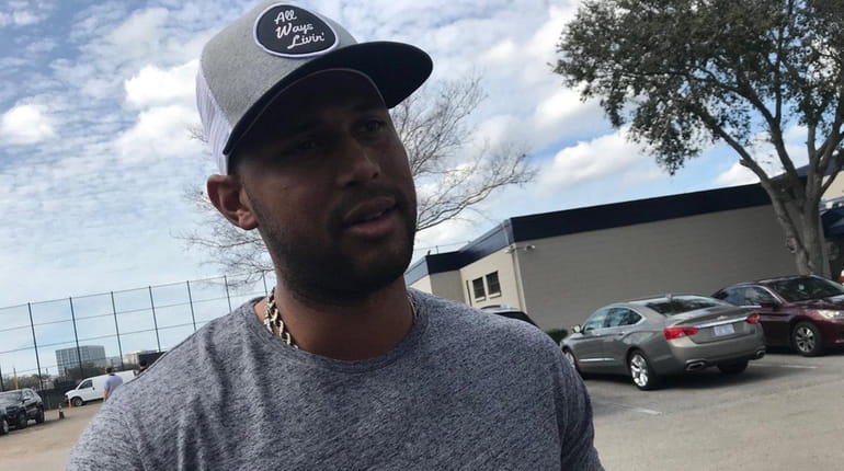 Yankees outfielder Aaron Hicks speaks to reporters after a workout...