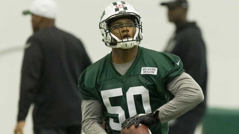 Linebacker and first-round draft pick Darron Lee works out during...