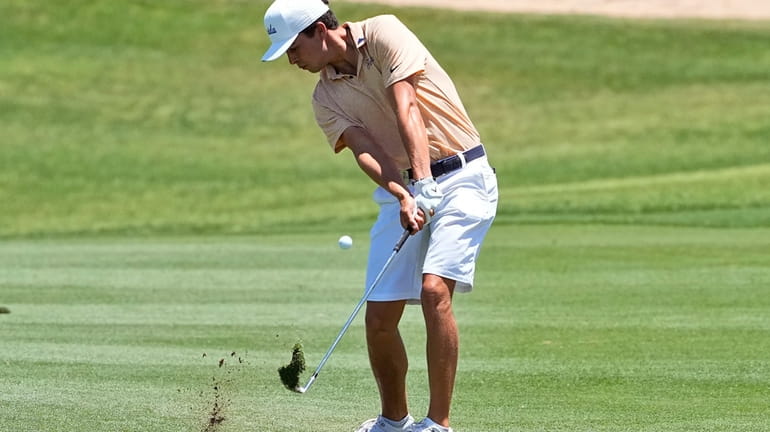 Florida golfer Fred Biondi hits from the second fairway during...