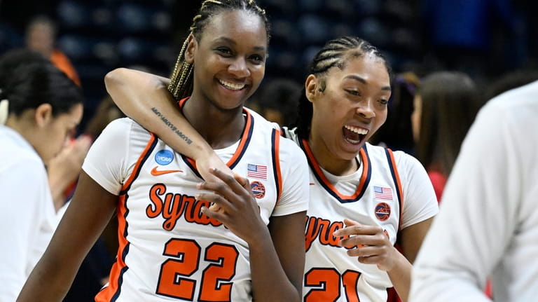 Syracuse forwards Kyra Wood (22) and Saniaa Wilson (21) celebrate...