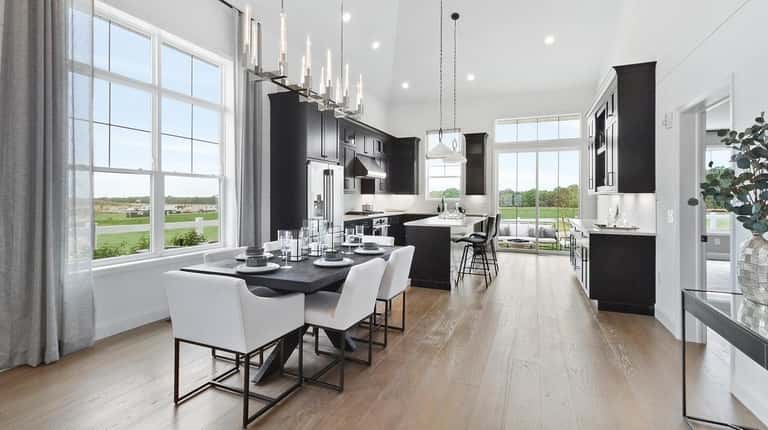 The Eastbourne Townhome dining and kitchen area in Country Pointe...