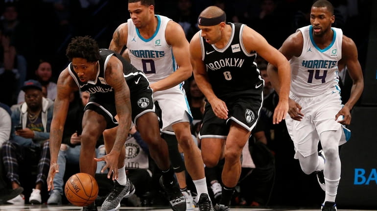Ed Davis #17 and Jared Dudley #6 of the Brooklyn...