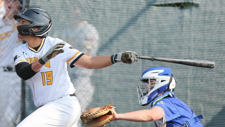 St Anthony’s Dan Scubla hits an RBI double in the...