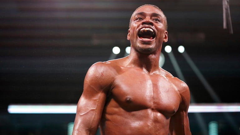 Errol Spence Jr. reacts during a world welterweight championship boxing...