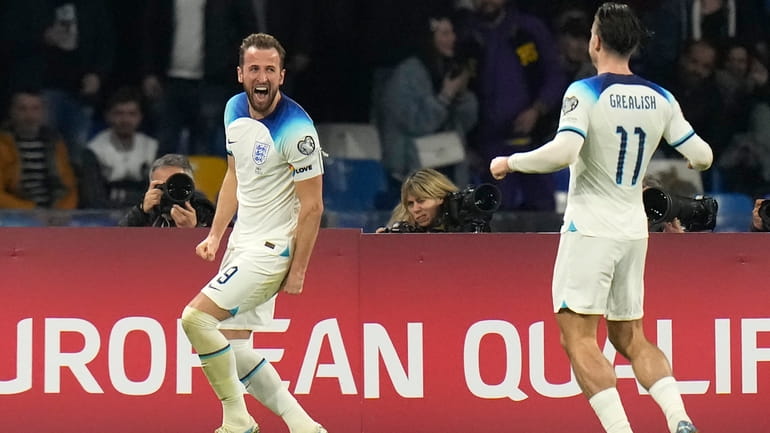 England's Harry Kane celebrates after scoring his side's second goal...
