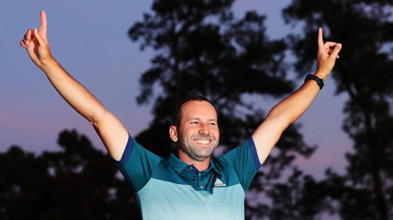 Sergio Garcia of Spain celebrates during the Green Jacket ceremony...