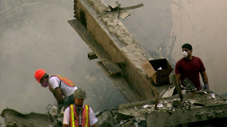 Rescuers searching for survivors at Ground Zero, Sept 13 2001.