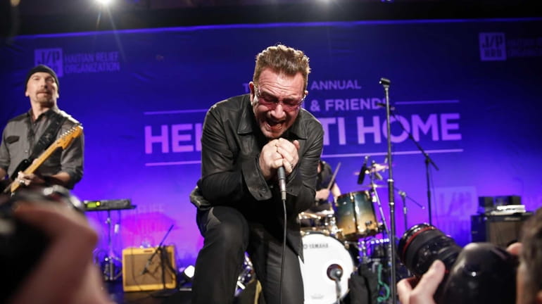 Bono performs at the third annual Sean Penn & Friends...