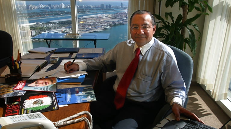 Manuel Rocha sits in his office at Steel Hector &...