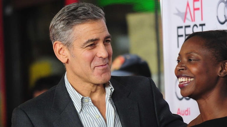 George Clooney arrives for a gala screening of the film...