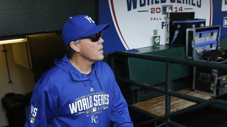 Kansas City Royals manager Ned Yost walks into the team's...