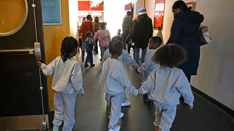 Children leave the theater at the Long Island Children’s Museum...