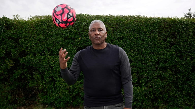 Former England international soccer player Ricky Hill poses for a...