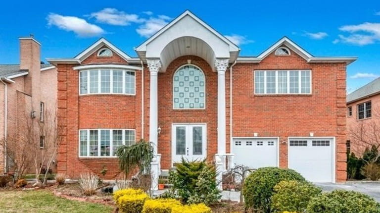 Priced at $1,125,000, this six-bedroom, six-bathroom brick Colonial  on Fairway...