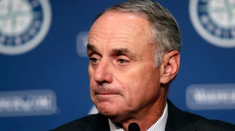 Rob Manfred, Commissioner of Baseball, addresses media members before a...