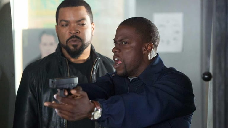 Fast-talking security guard Ben (Kevin Hart, right) joins his cop...