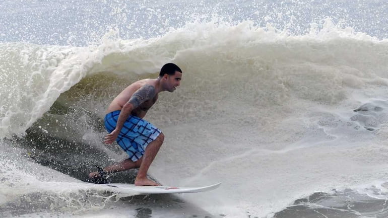 Danny Bobis surfs at Long Beach in September of 2010....