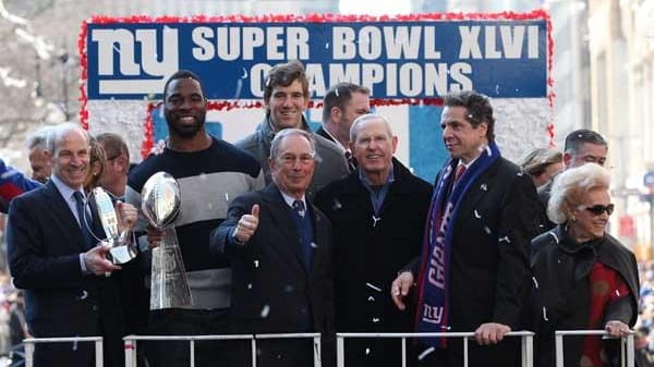 Mayor Michael Bloomberg, center, celebrates Giants Super Bowl win. (Getty)