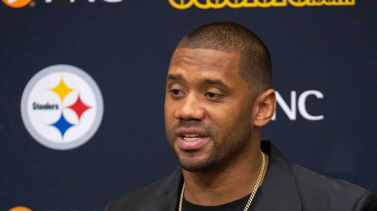 Pittsburgh Steelers newly signed quarterback Russell Wilson speaks with reporters...