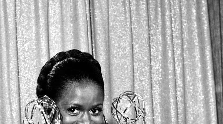 Cicely Tyson poses with her Emmy statuettes at the annual...