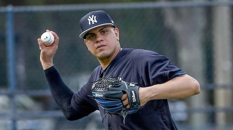 Yankees pitchers Dellin Betances takes infield drills during Spring Training...