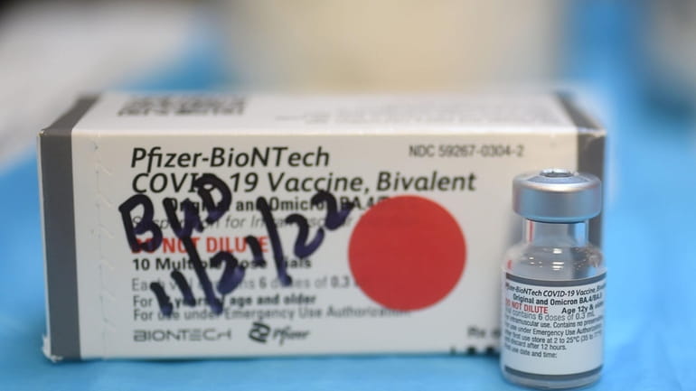 A vial containing the COVID-19 vaccine at a doctor's office...