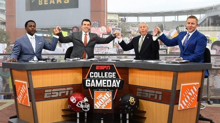 The ESPN College GameDay set, featuring (from left) Desmond Howard,...