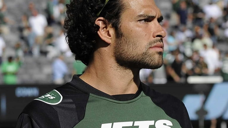 Mark Sanchez is seen on the field after his team's...