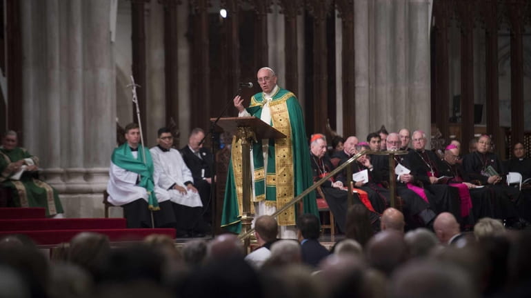 Pope Francis delivers his speech as he leads an evening...