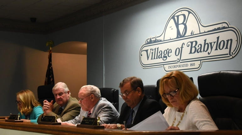 The Babylon Village board of trustees, from left: trustees Deborah...