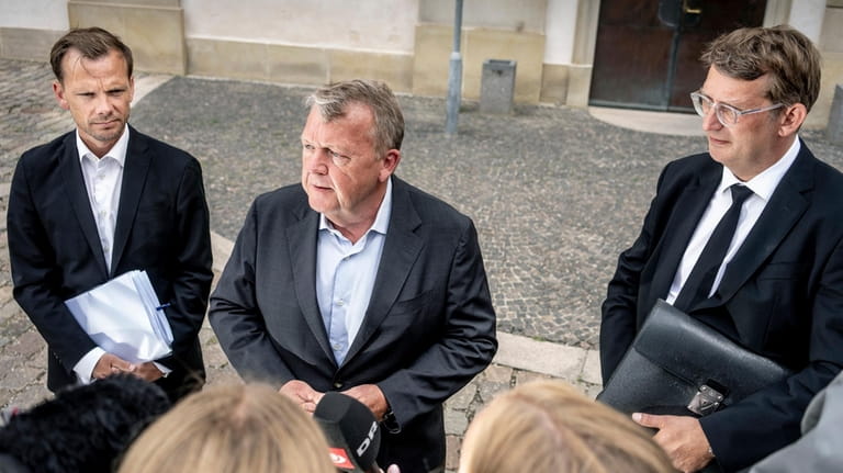 Denmark's Minister of Foreign Affairs Lars Loekke Rasmussen, centre, Minister...