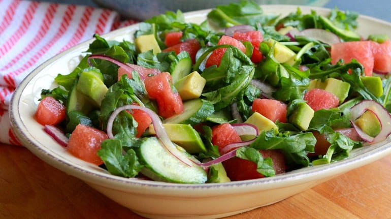 Arugula, avocado, red onion and watermelon dressed with a simple...
