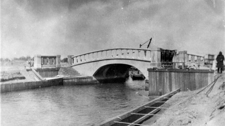 One of the original bridges, seen here around 1926, shortly...