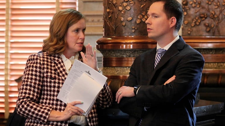 Kansas Senate Minority Leader Dinah Sykes, D-Lenexa, confers with Sen....