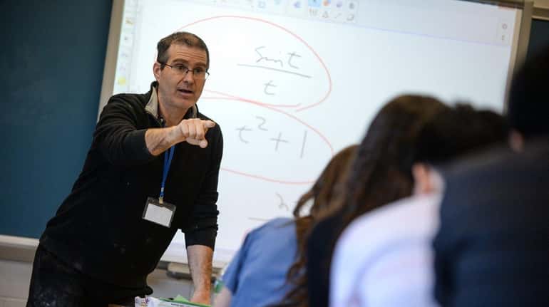 Math teacher Paul Bode teaches Advanced Placement calculus at Jericho...