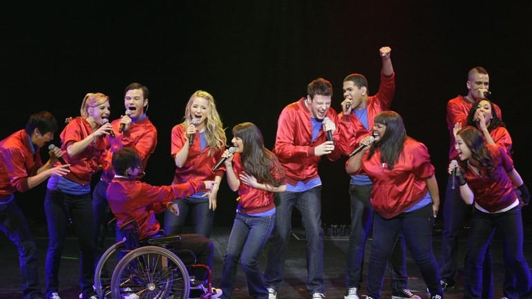 The cast of the popular television show "Glee" perform during...