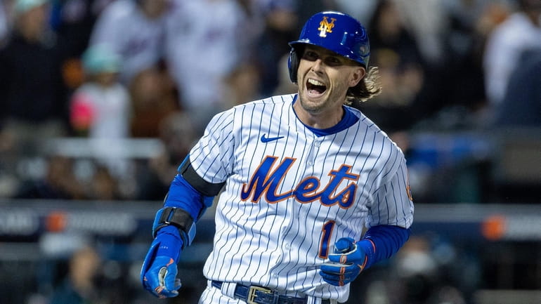The Mets’ Jeff McNeil reacts in the first inning against the Padres...